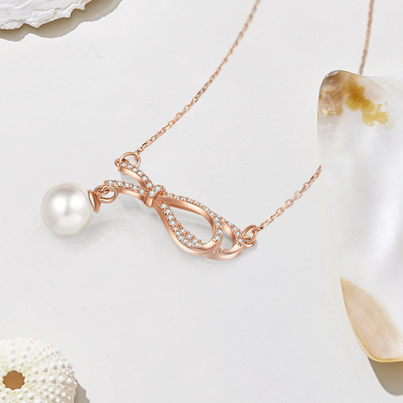 Crystal Bow Pearl Pendant Necklace – Silver